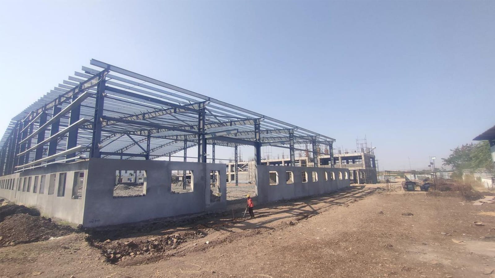 Steel portal frames erected at Kundlik Engineers