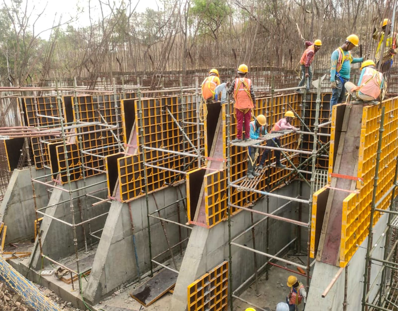 Crew working on formwork and reinforcement at the SSC Plant